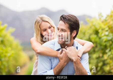 Young happy woman embracing young handsome man Banque D'Images