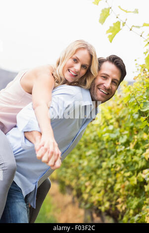 Young happy woman embracing young handsome man Banque D'Images