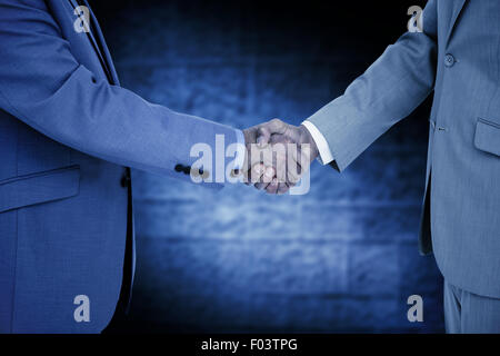 Composite image shaking hands Banque D'Images