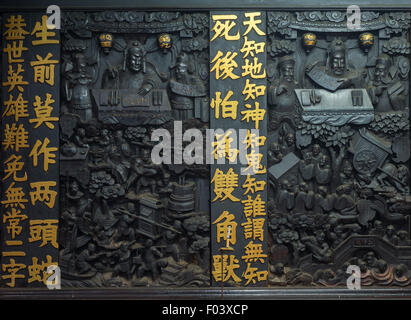 Des sculptures en bois à l'Empereur Jade (pagode Chua Ngoc Hoang ou Phuoc Hai Tu) Saigon Vietnam Banque D'Images