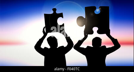 Composite image of businessman holding Banque D'Images