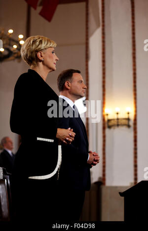 Varsovie, Pologne. Le 06 août, 2015. Le nouveau président de la Pologne, Andrzej Duda et sa femme Kornhauser-Duda Agata, assister à une messe à St John's à consigner vos bagages pendant l'inauguration présidentielle de Varsovie.Pologne's nouveau Président a été inauguré dans la capitale de la Pologne ville de Varsovie. M. Andrzej Duda a remporté l'élection présidentielle à la fin de mai en Pologne. Il a prêté serment en tant que 4e de la Pologne Président démocratiquement élu en Pologne Sejm "du" le mardi matin. Crédit : Anna Ferensowicz/Pacific Press/Alamy Live News Banque D'Images