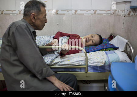 Beijing, Chine. 7 juin, 2014. La mort est presque la seule chose qui peut être sûr dans la vie, c'est la destination finale pour tout le monde, simplement le cycle de la vie. Mais dans la société chinoise, le refus de la mort est extrêmement forte et tout ce qui c'est censé apporter le malheur, même à la mort liée à la langue ou même y penser. Cette horreur de la mort signifie beaucoup refusent d'accepter son caractère inévitable.Il y a une place pour la mort. Au cours des 27 dernières années, plus de 30 000 patients ont passé leurs derniers jours dans là que signifie autour de 3 patients avaient disparu (die) à tous les jours. C'est Banque D'Images