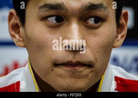 Kazan, Russie. 9 Août, 2015. Piscine chinois Sun Yang réagit au cours d'une conférence de presse au Championnats du Monde de la FINA à Kazan, Russie, 9 août, 2015. Sun Yang a donné sa chance de défendre son titre à 1 500m nage libre aux championnats du monde de la Kazan comme à l'âge de 23 ans, s'est retiré de la version finale du procès-verbal avant qu'il ait commencé à cause d'un malaise cardiaque le dimanche. Credit : Zhang Fan/Xinhua/Alamy Live News Banque D'Images