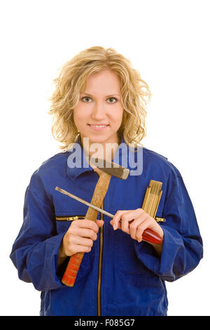 Artisane Smiling holding différents outils dans ses mains Banque D'Images