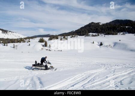 L'homme sur la motoneige, Jackson Hole, Wyoming Banque D'Images