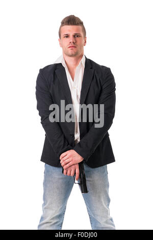 Homme élégant avec arme à feu, habillé comme un espion ou agent secret, avec écouteurs, isolated on white Banque D'Images