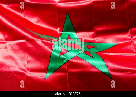 Drapeau national marocain avec l'étoile verte sur fond rouge Banque D'Images