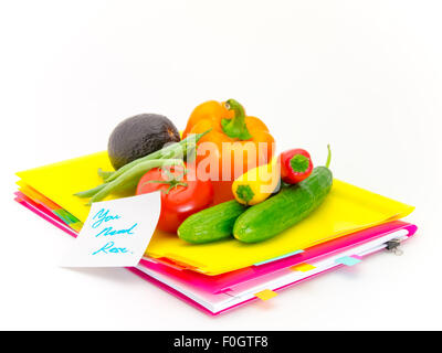 Présenter des légumes et des messages pour careing travail dur. Banque D'Images