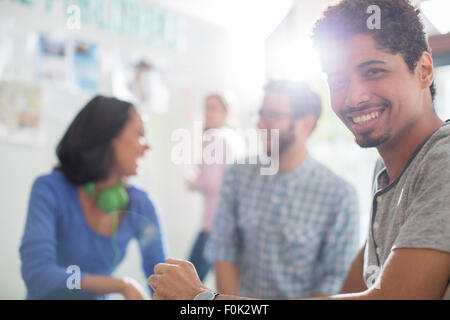 Portrait confiant creative businessman in meeting Banque D'Images