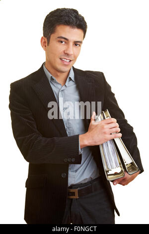 Businessman carrying beaucoup de fichiers Banque D'Images