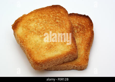 Croûtons sur fond blanc croûtons de pain isolés. Banque D'Images