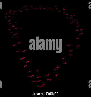 La Volée d'oiseaux dans la forme de la lettre d Banque D'Images