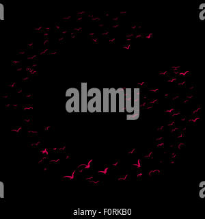 La Volée d'oiseaux dans la forme de la lettre g Banque D'Images