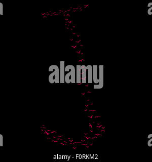 La Volée d'oiseaux dans la forme de la lettre j Banque D'Images