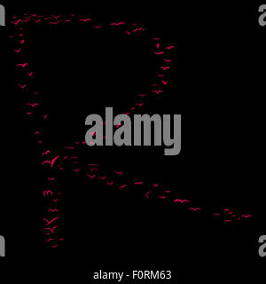 La Volée d'oiseaux dans la forme de la lettre r Banque D'Images