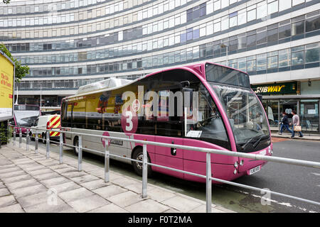 Navette métro bus électrique libre service dans le centre-ville de Manchester England UK Banque D'Images