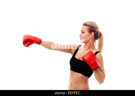 Les femmes en bonne santé fitness boxing dans studio isolé en studio Banque D'Images