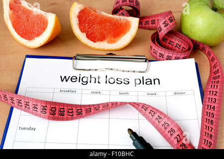 Papier avec plan de perte de poids et de pamplemousse Banque D'Images