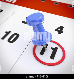 Calendrier et pousser l'axe bleu. Marque sur le calendrier en 11. Banque D'Images