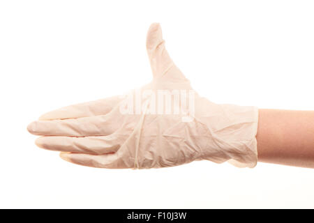 Close up de la main du médecin en blanc les gants chirurgicaux stérilisés pour donner handshake against white background Banque D'Images