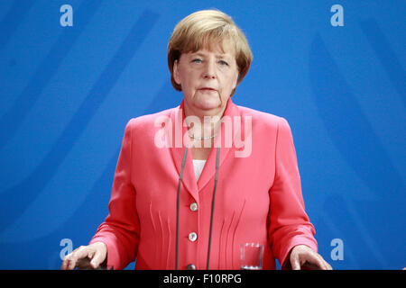 Berlin, Allemagne. Août 24, 2015. La chancelière allemande, Angela Merkel, le président français François Hollande et le président ukrainien Petro Poroschenko donner une conférence de presse conjointe après réunion à la chancellerie allemande à Berlin Allemagne le 24 août 2015. / Photo : Angela Merkel, chancelier allemand Crédit : Reynaldo Chaib Paganelli/Alamy Live News Banque D'Images