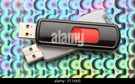 Les lecteurs flash USB sur l'abstract background Banque D'Images