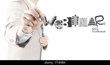 Businessman hand writing Webinar design graphique mot comme concept Banque D'Images