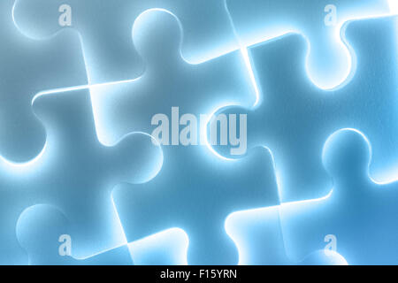 Arrière-plan de grands puzzles en bleu brillant Banque D'Images