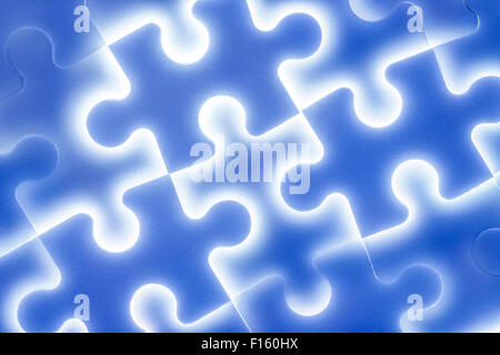 Arrière-plan de grands puzzles en bleu brillant Banque D'Images