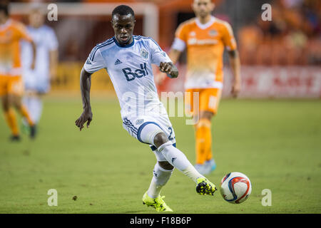 Houston, Texas, USA. Août 29, 2015. Avant Vancouver Whitecaps FC Kekuta Manneh (23) contrôle la balle pendant la 2ème moitié d'un jeu entre le MLS Houston Dynamo et les Whitecaps de Vancouver au stade BBVA Compass à Houston, TX le 29 août, 2015. La Dynamo a gagné 2-0. Credit : Trask Smith/ZUMA/Alamy Fil Live News Banque D'Images