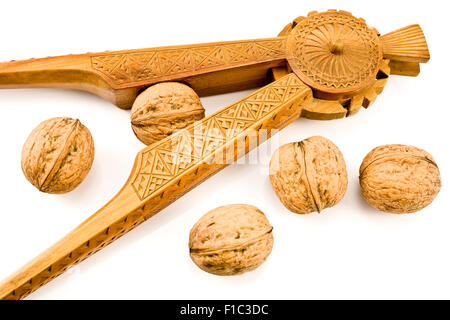 Meubles anciens en bois sculpté avec des noix Casse-noisette isolated on white Banque D'Images