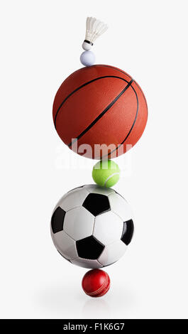 L'équilibrage de ballons de sport Banque D'Images