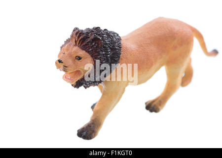 Un petit jouet lion ioslated sur fond blanc. Banque D'Images