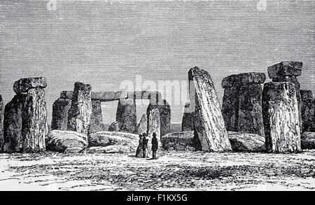 Vue du XIXe siècle sur Stonehenge près de Salisbury. Wiltshire, Angleterre. Les archéologues croient qu'il a été construit de 3000 BC à 2000 BC. Stonehenge aurait pu être un lieu de sépulture dès ses débuts. Les dépôts contenant des os humains datent de 3000 av. J.-C., lorsque le fossé et la banque ont été creusés pour la première fois, et se sont poursuivis pendant au moins 500 ans. Banque D'Images