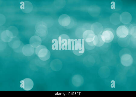 Lumière naturelle circulaire abstrait arrière-plan flou cyan Banque D'Images