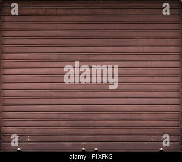 Brun métal porte de garage, volet roulant la texture d'arrière-plan Banque D'Images