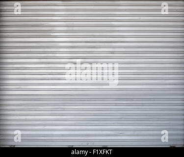 Volet roulant garage gris metal gate, la texture de fond photo Banque D'Images