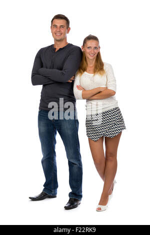 Beau jeune couple dans l'amour de toute sa hauteur, d'isoler sur blanc. Banque D'Images