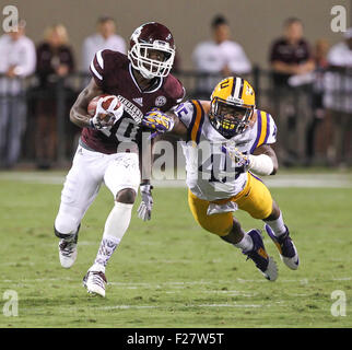 Mississippi State RB, Brandon Holloway (10 ) est attaqué par derrière par LSU LB, Deion Jones (45) au cours de la NCAA Football match entre la LSU Tigers et Mississippi State à Davis Wade Stadium de STARKVILLE, MS. Chuck lécher/CSM Banque D'Images