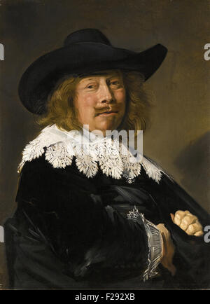 Frans Hals - Portrait d'un gentilhomme, demi-longueur en noir avec col et poignets en dentelle, et portant un chapeau à large chapeau noir Banque D'Images