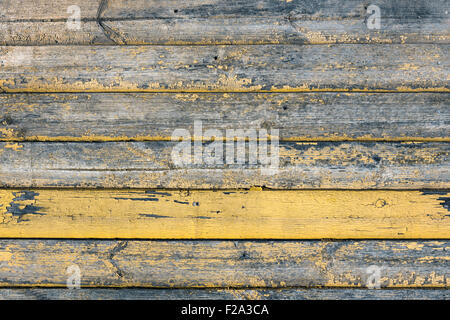 Vieux bois patiné avec texture peinture jaune Banque D'Images