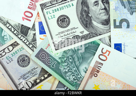 L'argent - l'arrière-plan de différentes devises Banque D'Images