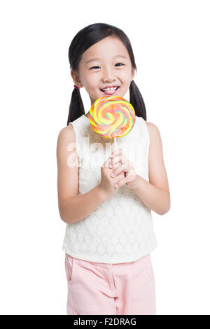 Happy girl with lollipop Banque D'Images