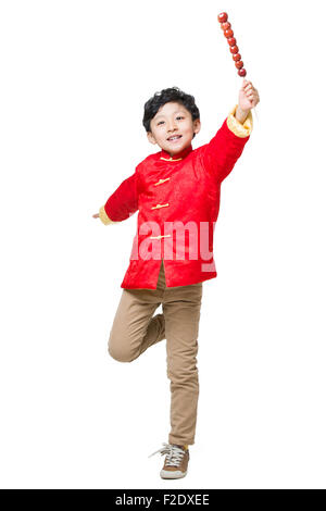 Cute boy holding haws confits Banque D'Images