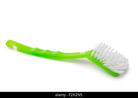 Brosse de lavage vaisselle vert isolé sur fond blanc Banque D'Images