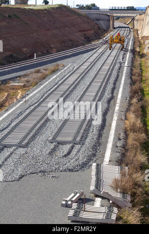 Chemin de fer sur la construction, avec la machine spécifique Banque D'Images