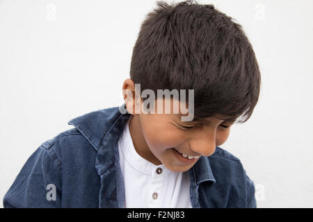 Asian boy laughing Banque D'Images