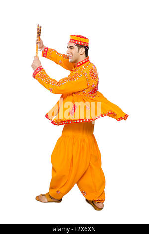 1 Indian Gujrati homme Navaratri Dandiya dance Banque D'Images