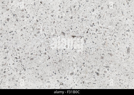 Seamless background texture de mur en béton gris avec du gravier Banque D'Images